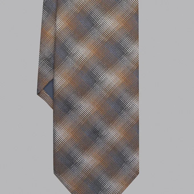 A close-up of the Duchamp Abstract Check Tie, showcasing the wider bottom end in its intricate abstract check pattern. The autumnal tones and fine silk texture add a luxurious touch to this elegant design.