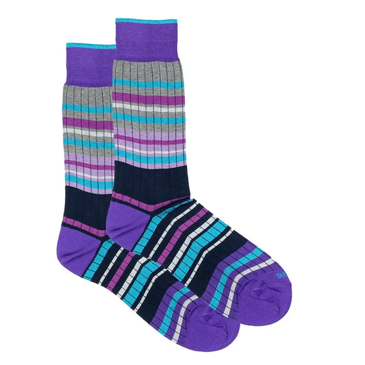 A pair of Duchamp London Block Stripe Socks in purple, featuring a bold block stripe design with a contrast heel and toe. The front sock is slightly overlapping the rear sock, showcasing the vibrant pattern and high-quality knitted cotton construction.